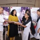 Dassehra Movie Singer Madhushree and Producer Aparana S Hosing Distributed Notebook at Nityanand BMC School